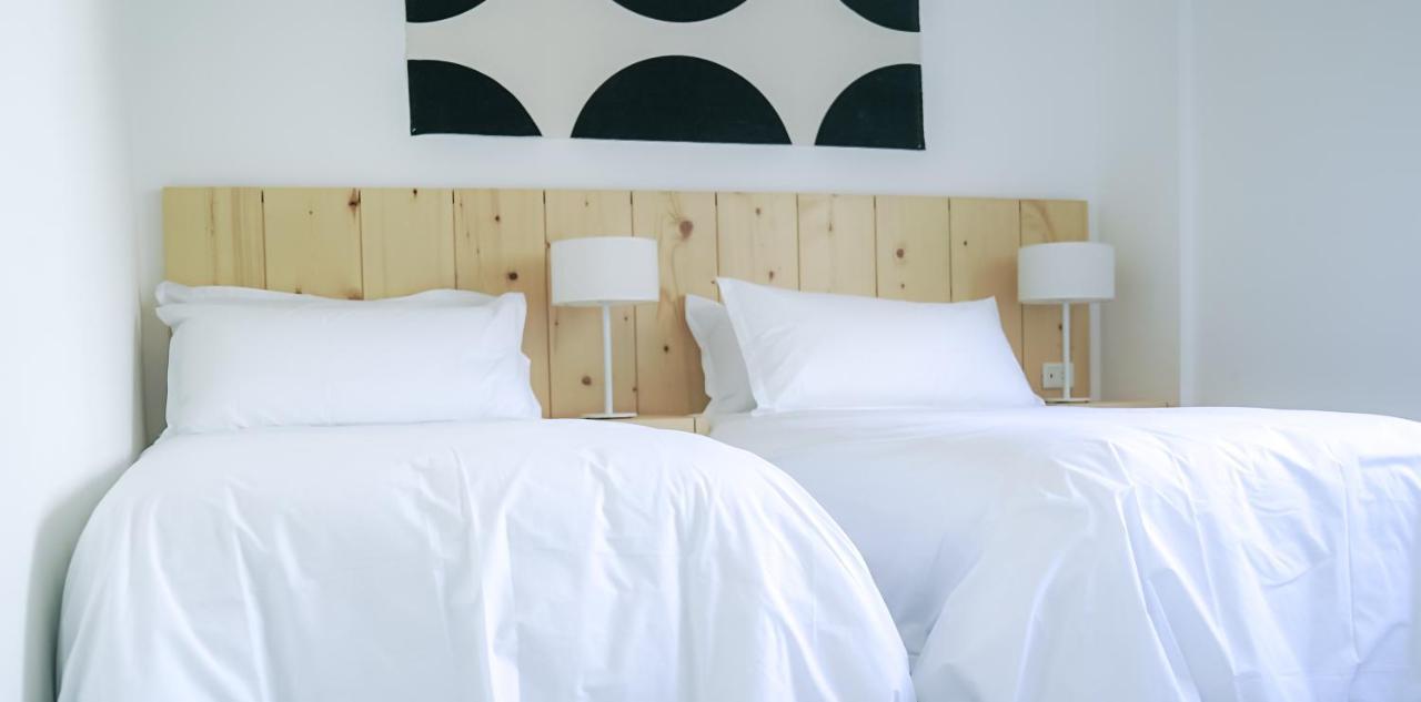Casagrande Hotel & Beach Club José Ignacio Exteriör bild A bed with white sheets
