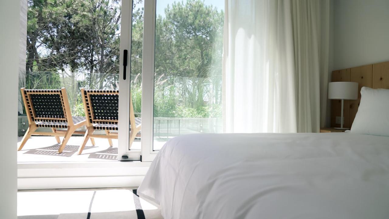 Casagrande Hotel & Beach Club José Ignacio Exteriör bild A bedroom at the hotel
